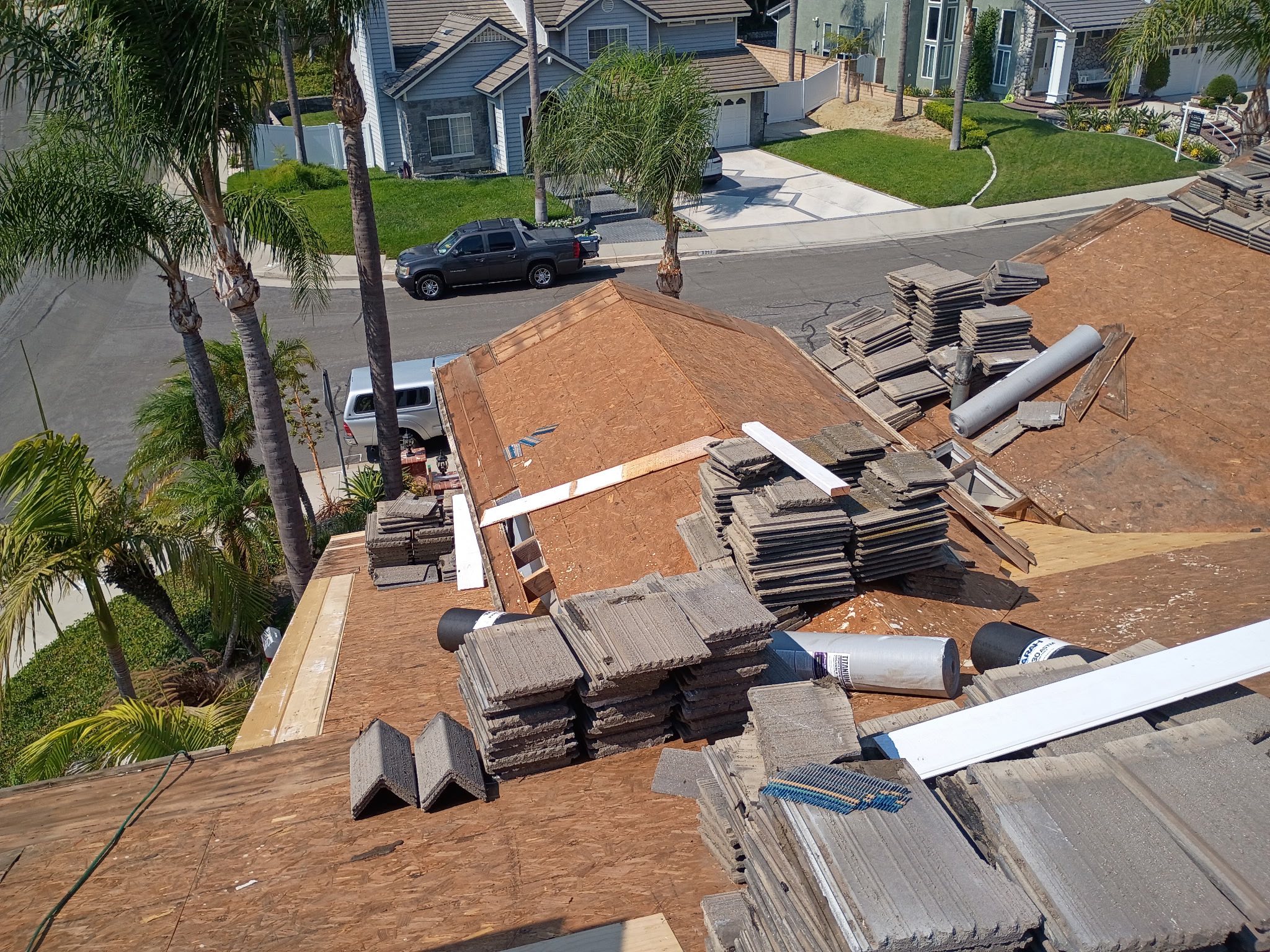Nye Construction crew working on a roof